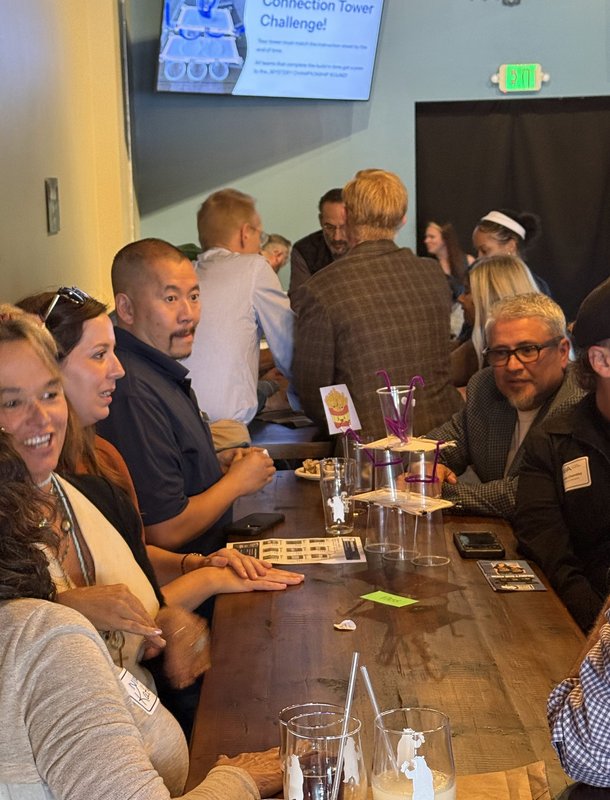 Guests laughing through the Connection Tower Challenge
