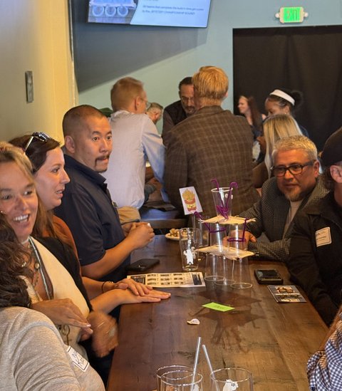 Guests laughing through the Connection Tower Challenge